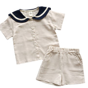 セットアップ 上下セット 半袖 シャツ ハーフパンツ 2点セット キッズ 子供服 男の子 女の子 男女兼用 ラウンドネック セーラーカラー風 ライン 前開き ボタン 半ズボン 短パン ウエストゴム ポケット付き マリン 単色 無地 シンプル 着回し かわいい おしゃれ カジュアル 定番 お出かけ 通園 通学 ユニセックス 青 ベージュ
