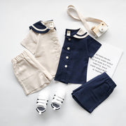 セットアップ 上下セット 半袖 シャツ ハーフパンツ 2点セット キッズ 子供服 男の子 女の子 男女兼用 ラウンドネック セーラーカラー風 ライン 前開き ボタン 半ズボン 短パン ウエストゴム ポケット付き マリン 単色 無地 シンプル 着回し かわいい おしゃれ カジュアル 定番 お出かけ 通園 通学 ユニセックス 青 ベージュ