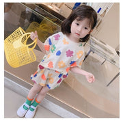 セットアップ 上下 2点セット キッズ ベビー 子供用 女の子 トップス ボトムス Tシャツ 半袖 ラウンドネック ショートパンツ ハーフパンツ ウエストゴム フリル フラワー お洒落 かわいい お出かけ 普段着 部屋着 普段使い 女児 子供服