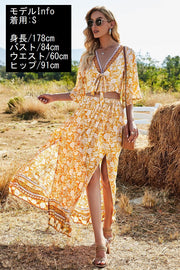 セットアップ ショート丈ブラウス ロングスカート レディース 7分袖 Aライン フレア マキシ丈 花柄 上下セット 2点セット 深Vネック ベルスリーブ フレアスリーブ プルオーバー クロップド丈 トップス ボトムス リボン ウエストゴム サイドスリット 総柄 プリント カジュアル おしゃれ かわいい 可愛い セクシー 大人女子 女性 ガールズ 婦人用 春 夏 秋 S M L
