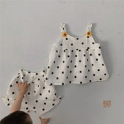 セットアップ 上下セット キャミソール ショートパンツ 2点セット キッズ 子供服 ベビー 赤ちゃん 女の子 トップス ボトムス ノースリーブ Uネック 袖なし ギャザー 水玉 ドット ひまわり ウエストゴム ブルマパンツ キュート ガーリー おしゃれ かわいい お出かけ 夏 白
