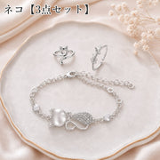 アクセサリー 3点セット 指輪 ブレスレット レディース 女性 リング ネコ 猫 リボン モチーフ かわいい フェミニン キュート かわいい 上品 贈り物 ギフト プレゼント