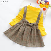 ドッキングワンピース キッズ 子供服 子ども服 女の子 フェイクツーピース フェイクレイヤード 重ね着風 ハイネック 長袖 Aライン ミニスカート ミニ丈 フレアスカート リボン 袖フリル ジャンパースカート風 総柄 チェック ブラック ピンク イエロー ガーリー 可愛い キュート カジュアル ライトフォーマル
