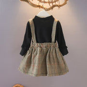 ドッキングワンピース キッズ 子供服 子ども服 女の子 フェイクツーピース フェイクレイヤード 重ね着風 ハイネック 長袖 Aライン ミニスカート ミニ丈 フレアスカート リボン 袖フリル ジャンパースカート風 総柄 チェック ブラック ピンク イエロー ガーリー 可愛い キュート カジュアル ライトフォーマル
