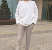 長袖Tシャツ 長袖カットソー レディース トップス プルオーバー 丸首 ラウンドネック 丈長め 無地 柄なし シンプル 単色 着回し力あり 定番 オーソドックス おしゃれ かわいい カジュアル ラフ ブラック 黒 ホワイト 白 女性用 婦人用