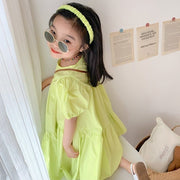 ワンピース キッズ 子供用 子ども用 女の子 半袖 丸首 ラウンドネック プルオーバー ティアードスカート フレアスカート 膝丈 パフスリーブ アシンメトリー アシメデザイン 無地 フェミニン ガーリー 可愛い かわいい キュート 春 夏 夏ワンピース リゾート 旅行 ビビッドカラー
