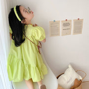 ワンピース キッズ 子供用 子ども用 女の子 半袖 丸首 ラウンドネック プルオーバー ティアードスカート フレアスカート 膝丈 パフスリーブ アシンメトリー アシメデザイン 無地 フェミニン ガーリー 可愛い かわいい キュート 春 夏 夏ワンピース リゾート 旅行 ビビッドカラー