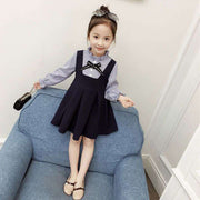 ワンピース 子供服 キッズ 女の子 長袖 フリル襟 スタンドカラー 膝丈 フレア フェイクレイヤードスタイル 重ね着風デザイン ストライプ柄 リボン 袖口ゴム かわいい おしゃれ お出かけ トラッド 清楚