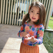 カットソー キッズ 子供服 子ども服 女の子 トップス 長袖 丸首 ラウンドネック クルーネック プルオーバー 薄手 総柄 花柄 フラワー お花 ピンク グリーン ホワイト ポップ カジュアル 華やか 可愛い キュート おしゃれ 春 夏