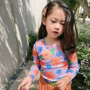 カットソー キッズ 子供服 子ども服 女の子 トップス 長袖 丸首 ラウンドネック クルーネック プルオーバー 薄手 総柄 花柄 フラワー お花 ピンク グリーン ホワイト ポップ カジュアル 華やか 可愛い キュート おしゃれ 春 夏