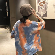 チュニック カットソー Tシャツ レディース 女性 トップス 半袖 丸首 ラウンドネック オーバーサイズ ビッグシルエット 総柄 タイダイ柄 染物風 カジュアル おしゃれ