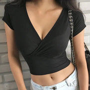 カットソー レディース 女性 トップス 半袖 Vネック カシュクール ショート丈 ミニ丈 ヘソだし 胸元深め 無地 ブラック ホワイト シンプル セクシー 大人っぽい かわいい キュート 薄手 夏