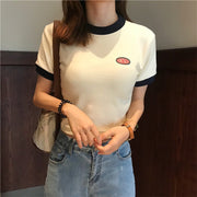カットソー 半袖 クルーネック 丸首 トップス レディース 女性 婦人服 ミニ丈 ショート丈 クロップド丈 Tシャツ ワンポイント おしゃれ かわいい カジュアル