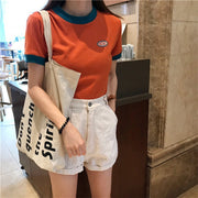 カットソー 半袖 クルーネック 丸首 トップス レディース 女性 婦人服 ミニ丈 ショート丈 クロップド丈 Tシャツ ワンポイント おしゃれ かわいい カジュアル