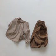 ロングTシャツ カットソー キッズ ベビー 子供用 男の子 女の子 トップス 長袖 前ボタン ラウンドネック ラウンドカット 無地 単色 シンプル お洒落 お出かけ 着回し力 合わせやすい 普段使い 女児 男児 子供服