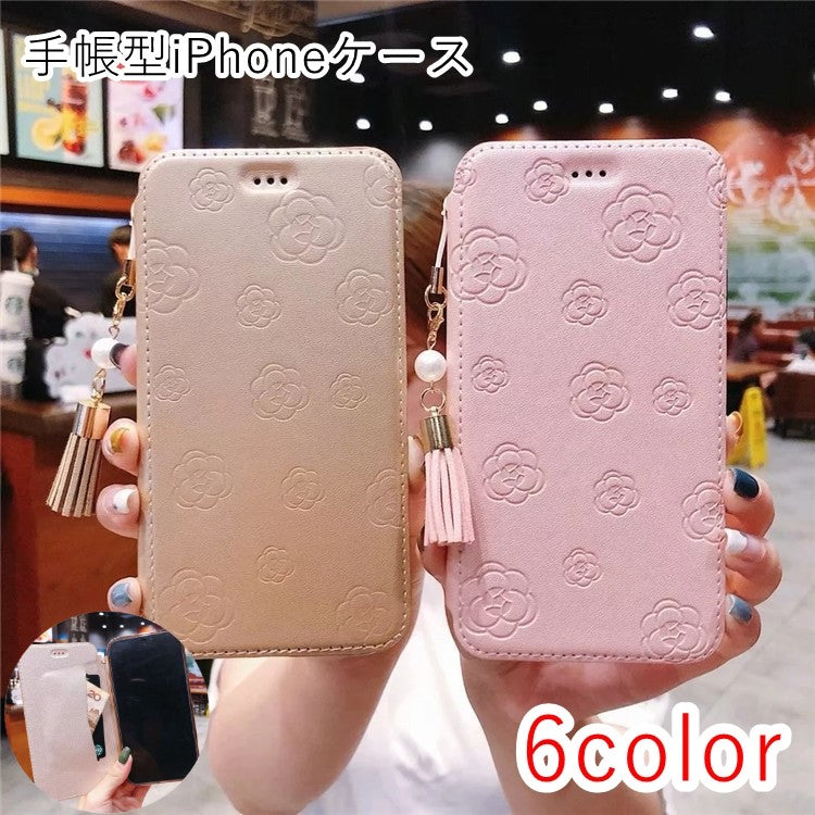 iPhoneケース スマホケース レディース 女性 スマホ雑貨 スマホアクセサリー 手帳型 カードケース付き ストラップ付き 二つ折り フリンジ フェイクレザー 総柄 花柄 フラワー ピンク ゴールドカラー ブラック かわいい キュート フェミニン ガーリー