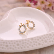ピアス スタッドピアス レディース アクセサリー ファッション小物 ラインストーン 円形 王冠 キラキラ 輝く 華やか フォーマル パーティー おしゃれ