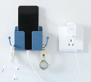ウォールラック スマホ充電スタンド リモコンラック フック付き 小物入れ 壁掛け収納 ウォールケース スマホホルダー 壁面収納 整理整頓 ケーブル穴 小物入れ 眼鏡スタンド 粘着テープ式 穴あけ不要 収納用品 便利グッズ シンプル スタイリッシュ