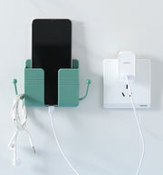 ウォールラック スマホ充電スタンド リモコンラック フック付き 小物入れ 壁掛け収納 ウォールケース スマホホルダー 壁面収納 整理整頓 ケーブル穴 小物入れ 眼鏡スタンド 粘着テープ式 穴あけ不要 収納用品 便利グッズ シンプル スタイリッシュ
