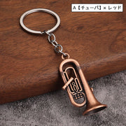 キーリング キーホルダー バッグチャーム ギター 管楽器 金管楽器 楽器 トランペット サクソフォーン サックス コルネット リアル メタル調 金属製 お洒落 可愛い 部活 学生 お揃い プレゼント ブロンズカラー