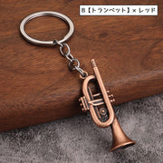 キーリング キーホルダー バッグチャーム ギター 管楽器 金管楽器 楽器 トランペット サクソフォーン サックス コルネット リアル メタル調 金属製 お洒落 可愛い 部活 学生 お揃い プレゼント ブロンズカラー