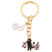 キーホルダー キーリング バッグチャーム 小物 雑貨 猫 キャット 黒猫 ピアノ 音符 音楽 レディース 男女兼用 メンズ かわいい シンプル モノクロ おしゃれ プレゼント ギフト 金色 黒 白