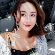 ピアス アシンメトリー 蝶 バタフライ フェイクパール ラインストーン フリンジ ロングピアス レディース アクセサリー お洒落 揺れる ゴールドカラー
