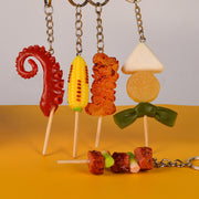 食品サンプル風キーホルダー 食品ミニチュアキーホルダー イミテーションフード バッグ 筆箱 ペンケース ポーチ 串 かわいい 可愛い 面白い 学校 中学生 高校生 目立つ デザイン豊富おでん BBQ 焼き鳥 トウモロコシ ホタテ