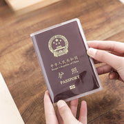 パスポートケース パスポートカバー 貴重品ケース 旅行用品 半透明 クリア ポケット付き 二つ折り シンプル 海外旅行 トラベル 便利グッズ