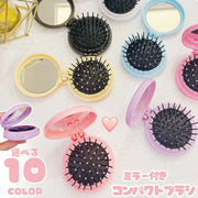 ヘアブラシ 折りたたみ ミラー付き 鏡付き くし 櫛 コンパクト 折り畳み ヘアコーム 持ち運び 持ち歩き ヘアケア用品 円形 丸型 サークル 便利