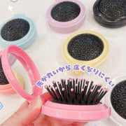 ヘアブラシ 折りたたみ ミラー付き 鏡付き くし 櫛 コンパクト 折り畳み ヘアコーム 持ち運び 持ち歩き ヘアケア用品 円形 丸型 サークル 便利