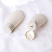 トラベルボトル 詰め替え容器 2個セット 60ml 小分け 化粧水 乳液 シャンプー 化粧品 持ち運び ミニサイズ 携帯 旅行 出張 便利 シンプル