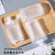 詰め替えボトル トラベルボトル ソープボトル 30ml 50ml 100ml 詰め替え容器 旅行用品 日用品雑貨 液体 小分け パウチ ハンドソープ シャンプー リンス かわいい おしゃれ 持ち運び 携帯 出張 旅行