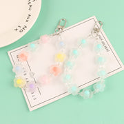 キーホルダー ハンドストラップ ストラップ バッグチャーム スマホストラップ フラワー 花 ビーズ クリア 半透明 かわいい キュート おしゃれ ガーリー プレゼント ギフト 青 紫 黄 カラフル 橙 ピンク