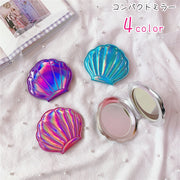 コンパクトミラー 手鏡 ハンドミラー レディース 女性 ファッション雑貨 貝殻型 シェル型 手のひらサイズ 小さめ 二つ折り ピンク シルバーカラー ブルー かわいい キュート メルヘンチック ファンタジック コスプレ小物
