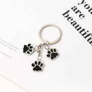 キーホルダー キーリング 肉球 足跡 犬 猫 チャーム おしゃれ かわいい イヌ いぬ ねこ ネコ ペット ギフト プレゼント 贈り物 レディース 女性 子ども こども 男女兼用