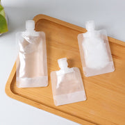 詰め替え容器 5枚セット 小分け 詰め替えパウチ 袋タイプ ディスペンサー 30ml 50ml 100ml トラベルボトル 旅行用品 出張 お出かけ ジム 化粧水 乳液 日焼け止め ボディソープ シャンプー リンス 絞れる 詰め替えやすい 中が見える 半透明 持ち運び 省スペース 日用品雑貨 白
