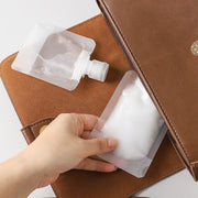 詰め替え容器 5枚セット 小分け 詰め替えパウチ 袋タイプ ディスペンサー 30ml 50ml 100ml トラベルボトル 旅行用品 出張 お出かけ ジム 化粧水 乳液 日焼け止め ボディソープ シャンプー リンス 絞れる 詰め替えやすい 中が見える 半透明 持ち運び 省スペース 日用品雑貨 白