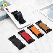 スマホベルト スマホバンド スマホホルダー スマホアクセサリー ホールドリング スマホリング スタンド機能 落下防止 レザー調 軽量 シンプル おしゃれ スマートフォン アンドロイド アイフォン android iPhone