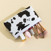 化粧ポーチ メイクポーチ コスメ用品 小物入れ ウシ柄 アニマル柄 ファスナー仕様 ジップ フェイクレザー レディース 女性 婦人用 可愛い おしゃれ