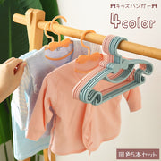 キッズハンガー ベビーハンガー 子供用ハンガー 5本セット 子供服 洗濯用品 物干しハンガー クローゼット収納 衣類収納 型崩れ防止 洗濯物干し リボン 引っ掛け 日用品 かわいい シンプル おしゃれ キュート ガーリー 青 ピンク オフホワイト 橙
