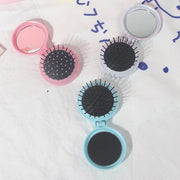 ヘアブラシ ミラー付き 折りたたみ式 ヘアケア 頭皮ケア ブラシ くし クシ 櫛 折り畳み コンパクト 円形 便利 携帯 外出 通勤 通学 普段使い コーム かわいい