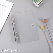 バインダー A6サイズ ルーズリーフ用 レディース 女性 メンズ 男性 ユニセックス 男女兼用 文房具 手帳 メモ帳 アルバム スナップボタン バンド付き クリア 透明 シルバーカラー ピンク イエロー シンプル カジュアル ポップ