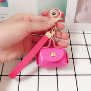 コインケース 小銭入れ キーホルダー バックチャーム ミニ財布 レディース 女性 財布 小さめ 小ぶり フェイクレザー スナップボタン バッグ型 コンパクト 無地 単色 シンプル おしゃれ かわいい 上品 キュート ガーリー お出かけ 通勤 通学 プレゼント お揃い ギフト 黒 赤 茶 ローズ ピンク 青