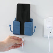 ウォールラック スマホ充電スタンド リモコンラック フック付き 小物入れ 壁掛け収納 ウォールケース スマホホルダー 壁面収納 整理整頓 ケーブル穴 小物入れ 眼鏡スタンド 粘着テープ式 穴あけ不要 収納用品 便利グッズ シンプル スタイリッシュ