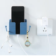 ウォールラック スマホ充電スタンド リモコンラック フック付き 小物入れ 壁掛け収納 ウォールケース スマホホルダー 壁面収納 整理整頓 ケーブル穴 小物入れ 眼鏡スタンド 粘着テープ式 穴あけ不要 収納用品 便利グッズ シンプル スタイリッシュ