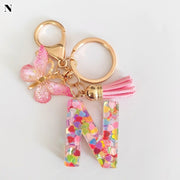 バッグチャーム キーホルダー キーリング レディース 女性 メンズ 男性 ユニセックス 男女兼用 お揃い ペアルック バッグ用アクセサリー カバン用アクセサリー ファッション雑貨 カニカン レバーカン 二重リング イニシャル アルファベット 蝶 バタフライ カラフル レインボー ポップ カジュアル トロピカル風 南国風 ハンドメイド風 推し活