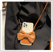 iPhoneケース ストラップ付き リボン カード入れ付き iPhoneカバー 首掛け 肩掛け 斜め掛け スマホケース スマホカバー シリコン レザー調 落下防止 傷予防 背面保護 iPhone11 iPhone12 13 14 ソリッドカラー 可愛い おしゃれ 外出 お出掛け 携帯ケース アイフォンケース