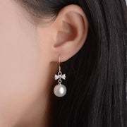 フックピアス アクセサリー レディース 女性用 ファッション小物 パール調 ラインストーン リボン 華やか おしゃれ エレガント 上品 フォーマル プレゼント ギフト 誕生日 記念日