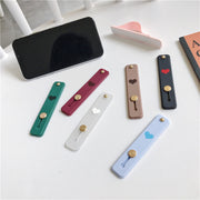 スマホベルト スマホバンド 落下防止 スマホスタンド スマホホルダー ホールドベルト バンド 背面ベルト 落下防止 片手操作 ハート ワンポイント 携帯電話 スマートフォン おしゃれ シンプル 便利 簡単 ファッション小物